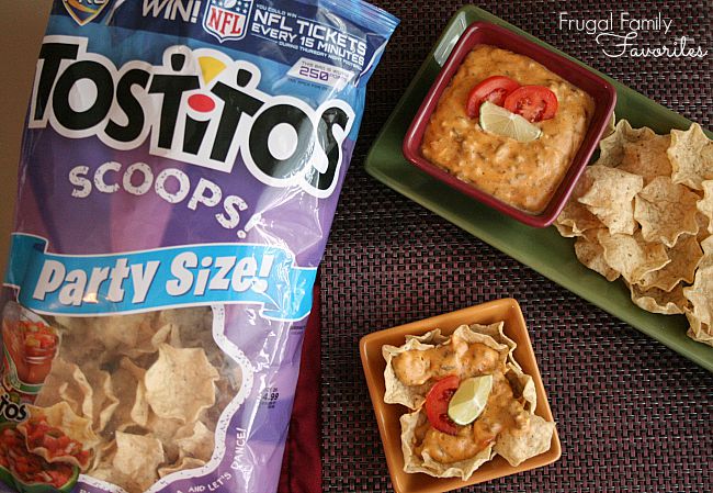 An amazingly-easy hot taco dip recipe that you can just toss in the slow cooker and serve in a couple of hours. Now who is the hostess with the mostess? You are!